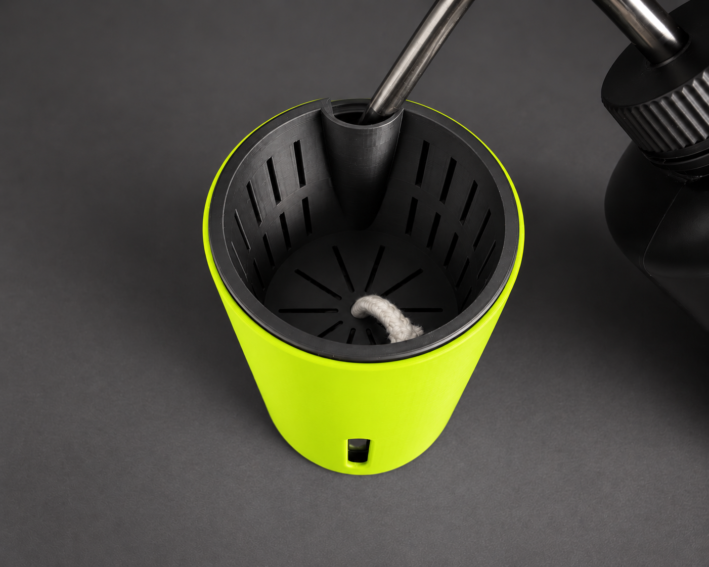 Neon Green medium cup showing the inner pot and refill opening with a watering bottle