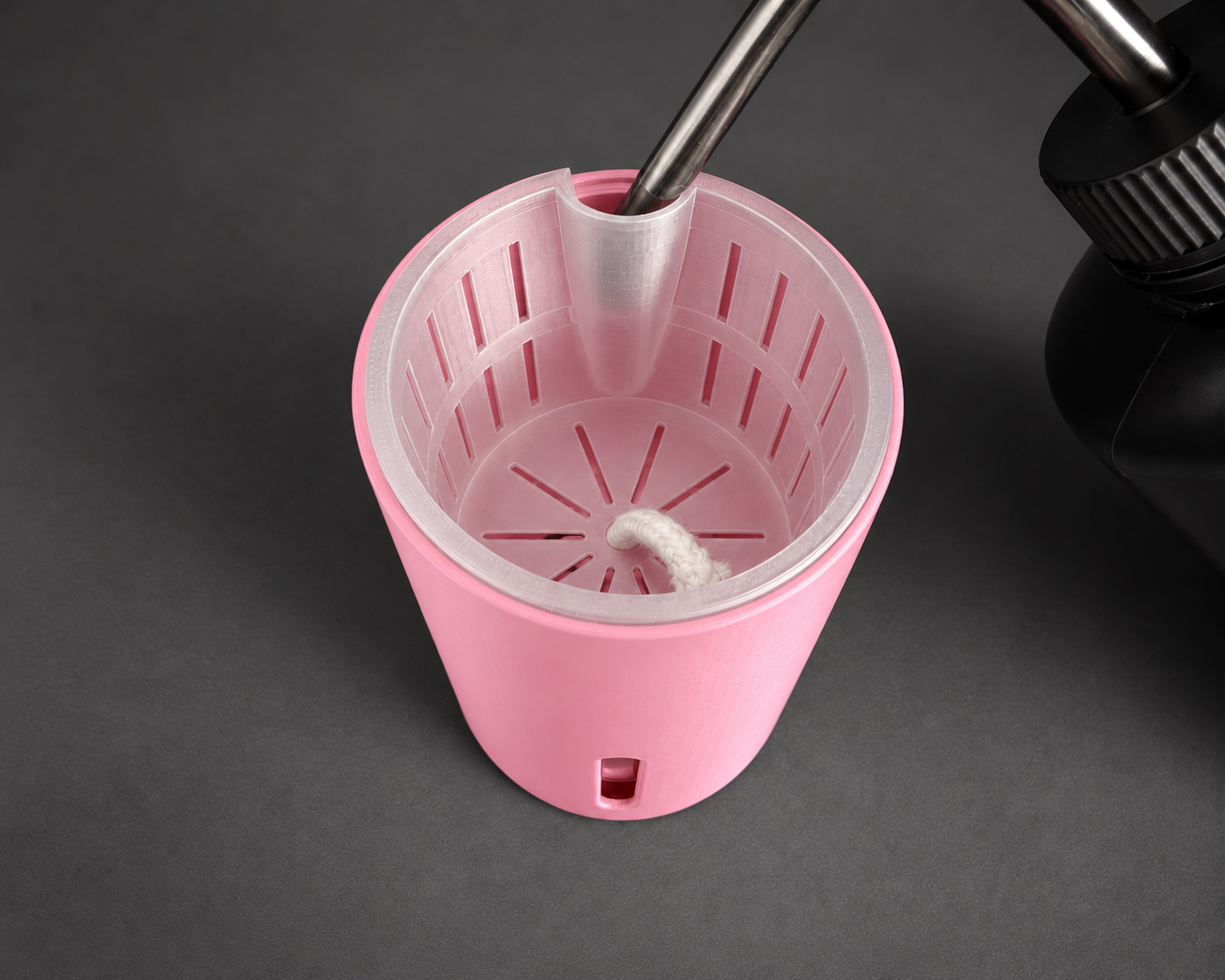 Silk Pink medium cup showing the inner pot and refill opening with a watering bottle
