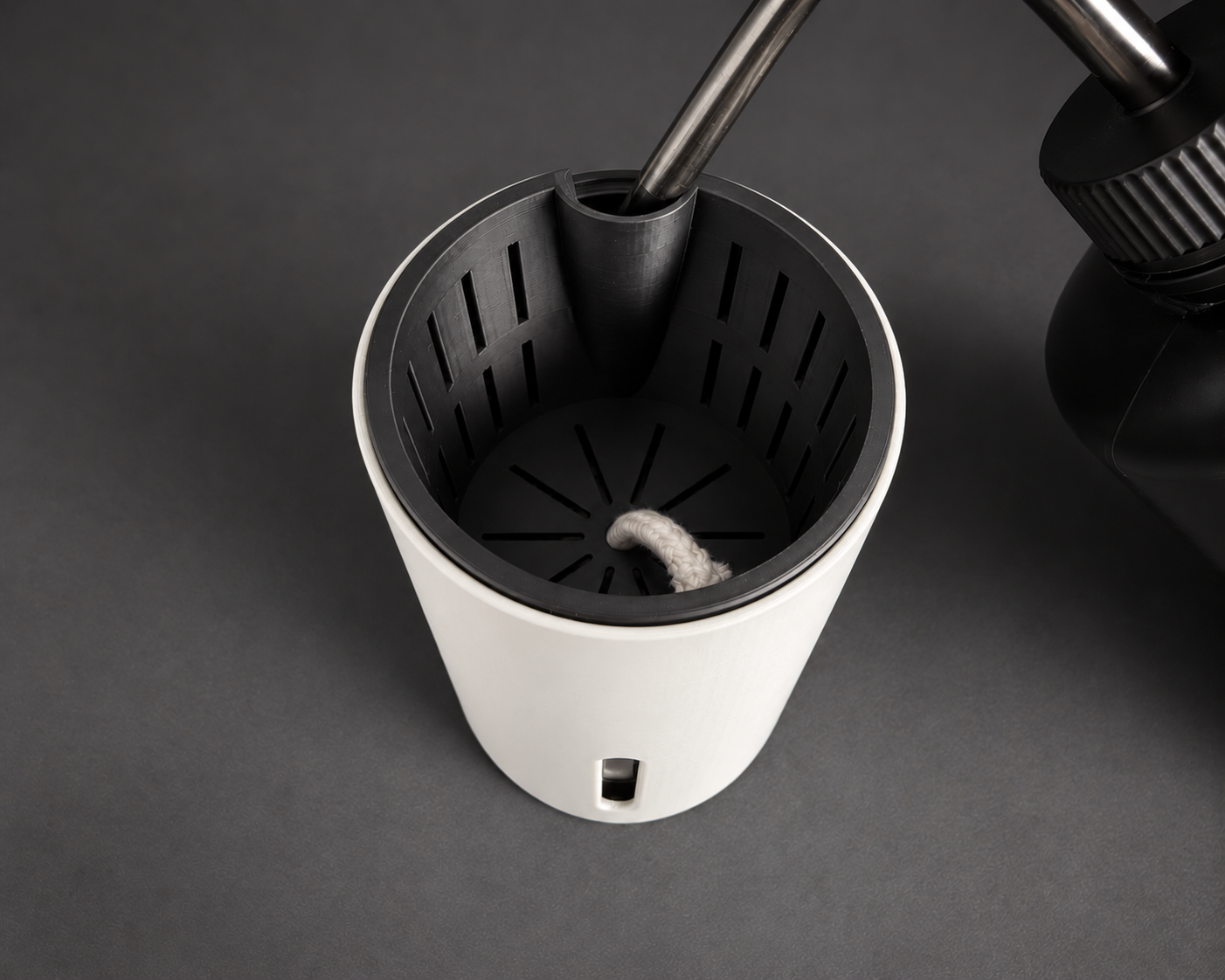 White medium cup showing the inner pot and refill opening with a watering bottle